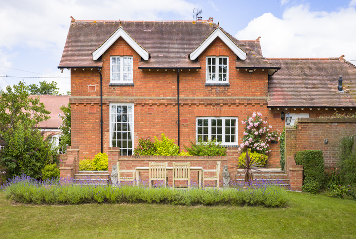 A large detached house with a garden in the UK